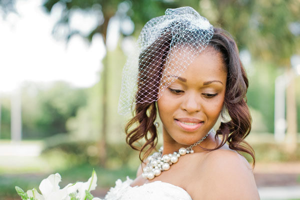 black bride with cage net veil and pearls