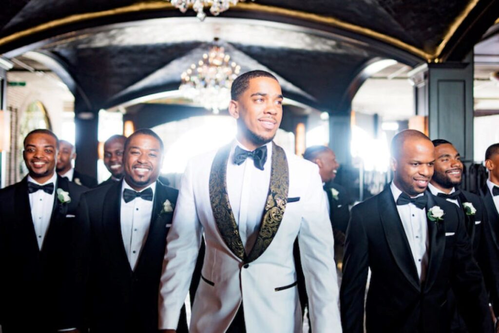 groomsmen smiling