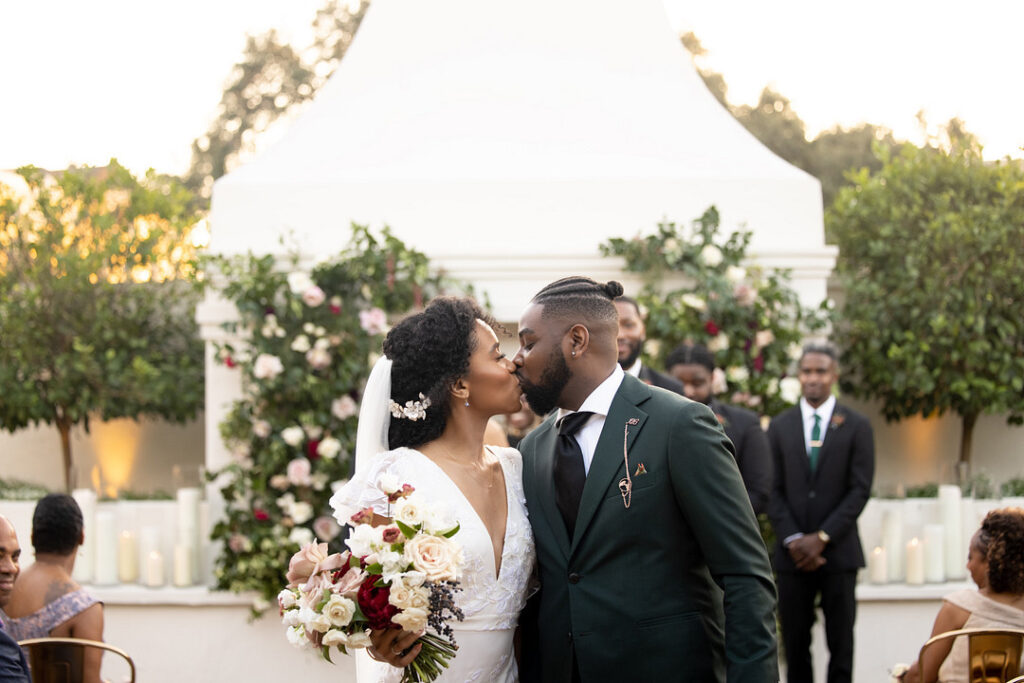 Soft flickering candles and cascading florals are just a few details from this intimate and romantic wedding at the Il Mercato New Orleans.