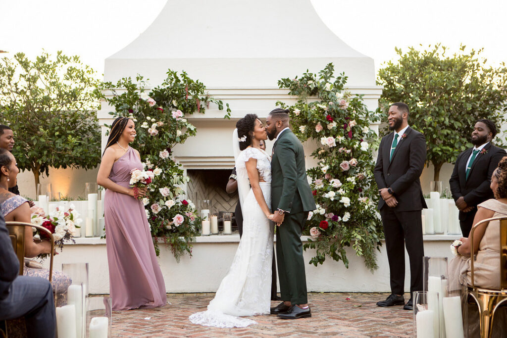 Soft flickering candles and cascading florals are just a few details from this intimate and romantic wedding at the Il Mercato New Orleans.