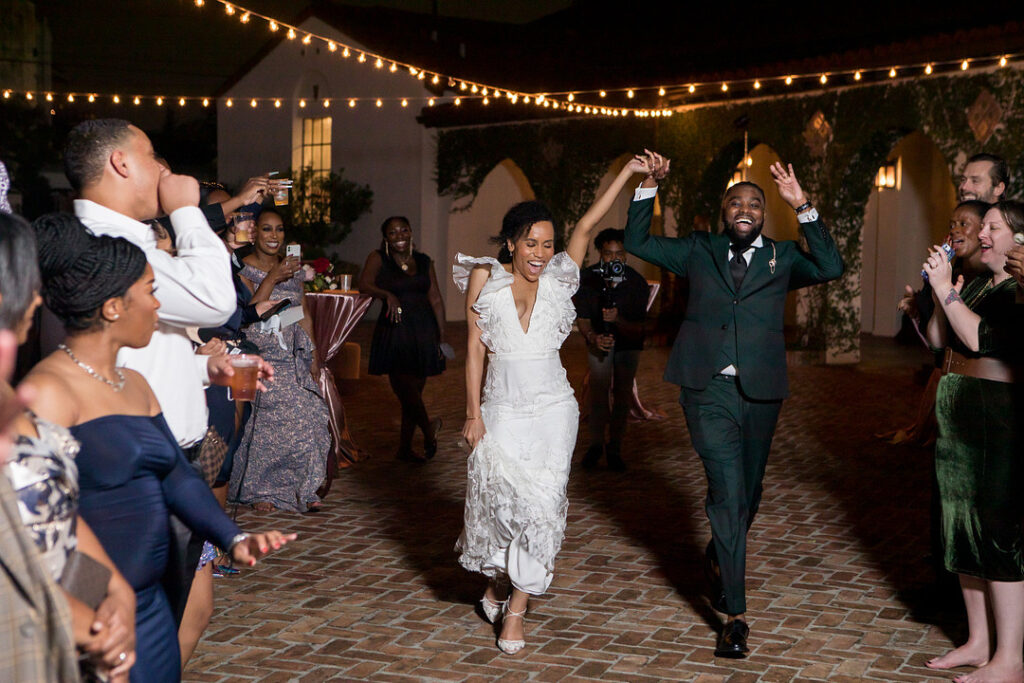 Soft flickering candles and cascading florals are just a few details from this intimate and romantic wedding at the Il Mercato New Orleans.