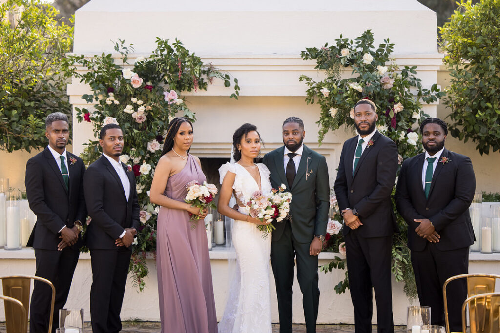 Soft flickering candles and cascading florals are just a few details from this intimate and romantic wedding at the Il Mercato New Orleans.