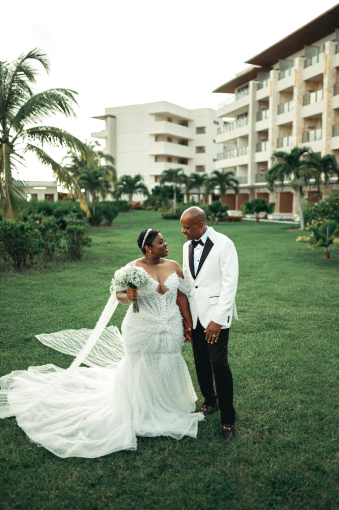 Modern wedding at Royalton Sky Terrace St. Lucia is island luxury at its finest with luscious florals, golden decor, and two luxury gowns.