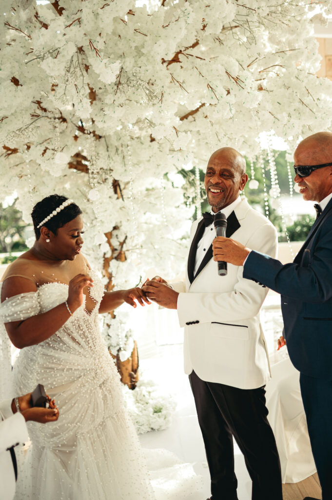 Modern wedding at Royalton Sky Terrace St. Lucia is island luxury at its finest with luscious florals, golden decor, and two luxury gowns.