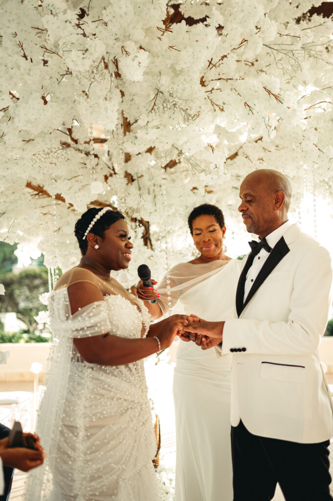 Modern wedding at Royalton Sky Terrace St. Lucia is island luxury at its finest with luscious florals, golden decor, and two luxury gowns.