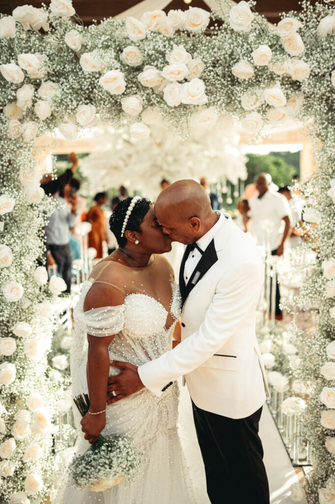 Modern wedding at Royalton Sky Terrace St. Lucia is island luxury at its finest with luscious florals, golden decor, and two luxury gowns.