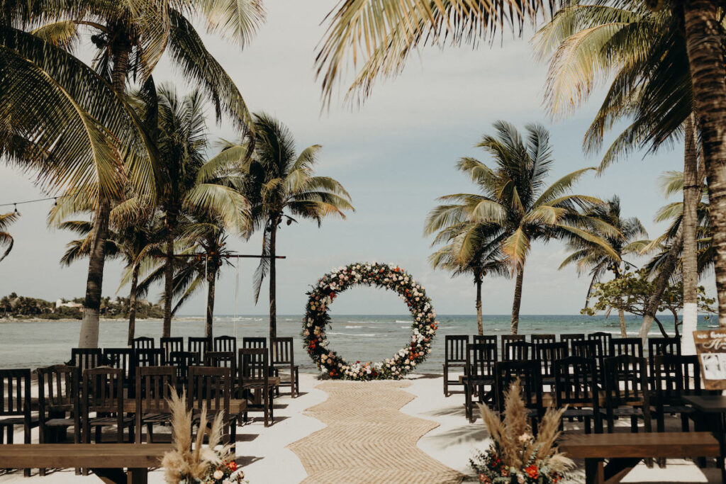 Darren & Nicole tied the knot in Playa del Carmen, Mexico, on a private beachfront palapa with tropical beach vibes, dinner, and dancing.