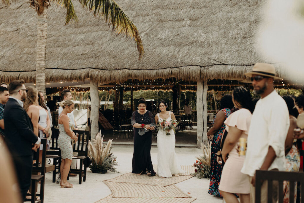 Darren & Nicole tied the knot in Playa del Carmen, Mexico, on a private beachfront palapa with tropical beach vibes, dinner, and dancing.