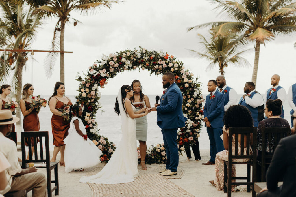 Darren & Nicole tied the knot in Playa del Carmen, Mexico, on a private beachfront palapa with tropical beach vibes, dinner, and dancing.