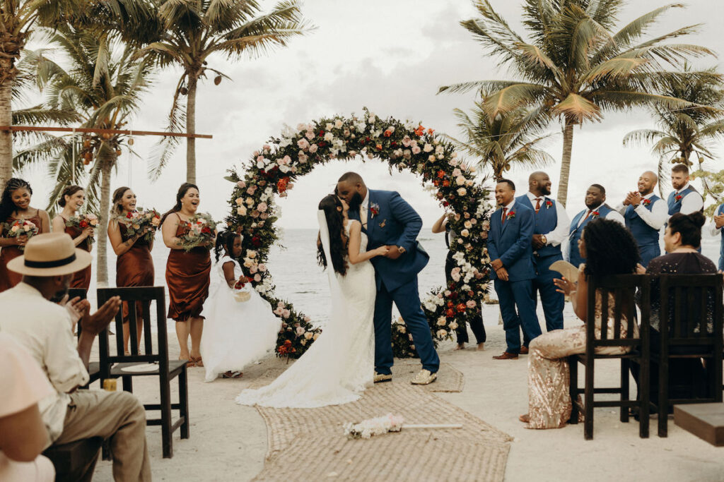 Darren & Nicole tied the knot in Playa del Carmen, Mexico, on a private beachfront palapa with tropical beach vibes, dinner, and dancing.