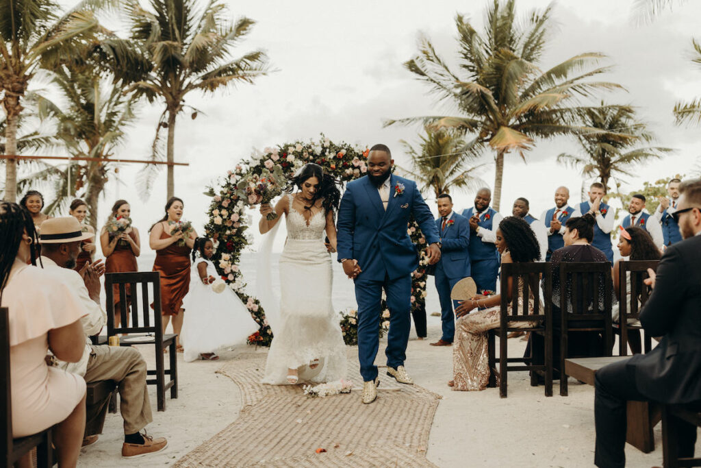 Darren & Nicole tied the knot in Playa del Carmen, Mexico, on a private beachfront palapa with tropical beach vibes, dinner, and dancing.