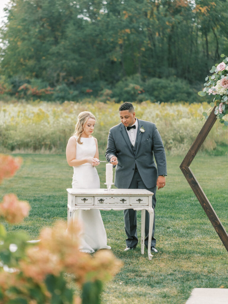 Pastel pink and mauve hues, a sleek modern gown, and a rustic chic venue at Ashton Hill Farm are just a few details from this adorable wedding in Iowa.