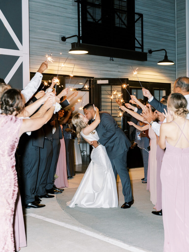 Pastel pink and mauve hues, a sleek modern gown, and a rustic chic venue at Ashton Hill Farm are just a few details from this adorable wedding in Iowa.