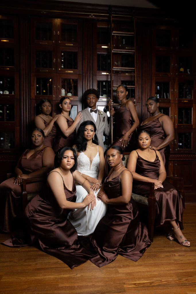 Bridal party poses in sultry brown hues in Elegant bohemian wedding in Atlanta  