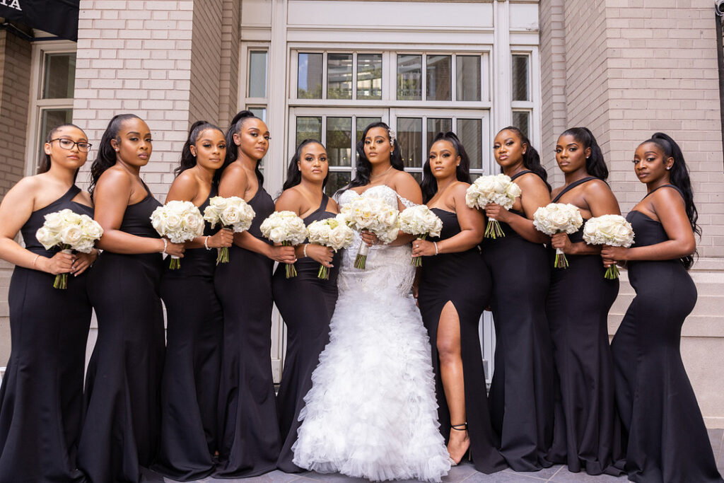 Everyone but the bride and groom wore black in this classic meets modern wedding at the Georgian Terrace Hotel in Atlanta, Georgia.