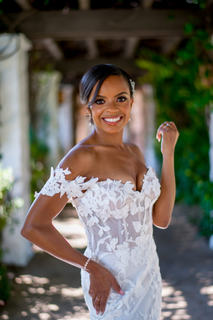 This hilltop vineyard wedding in Malibu is everything sweet with a sunset-inspired color story, an outdoor ceremony, and two glam dresses!