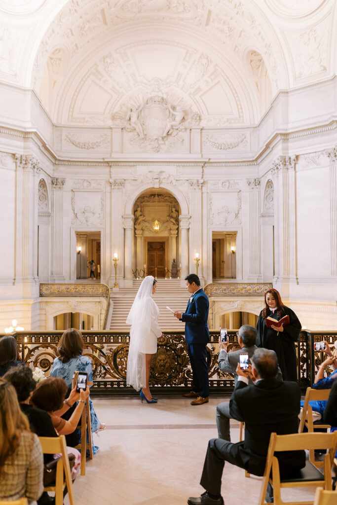 Rochelle and David's cozy and romantic city hall wedding in San Francisco had something blue plus Manolo's too!