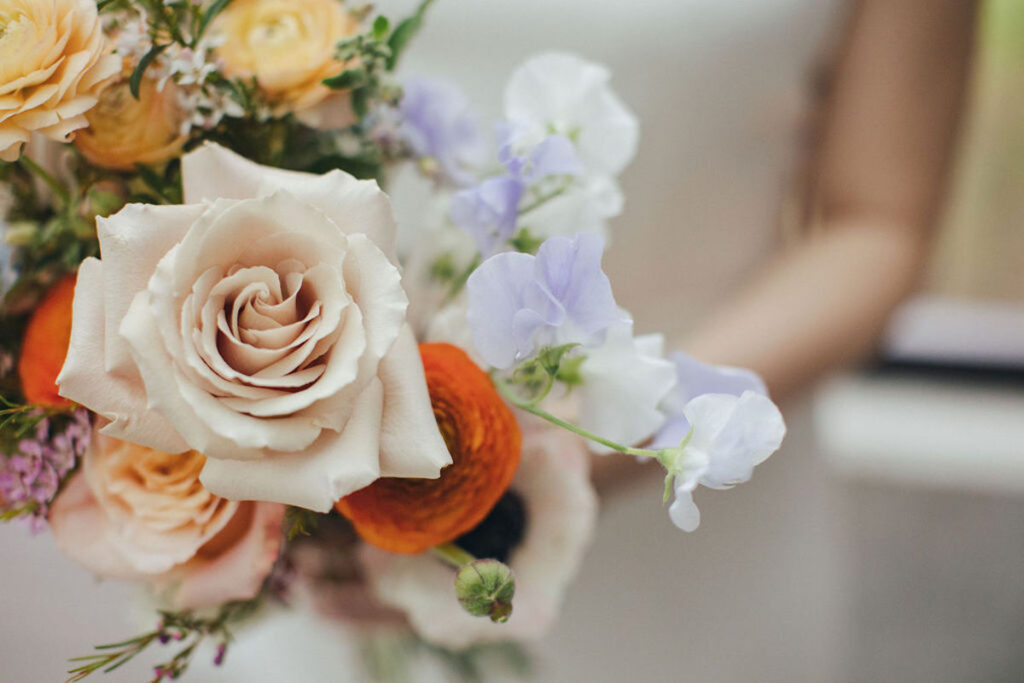 This spring-styled shoot in Seattle, Washington features delicate florals, colorful muted tones, and a charming venue!