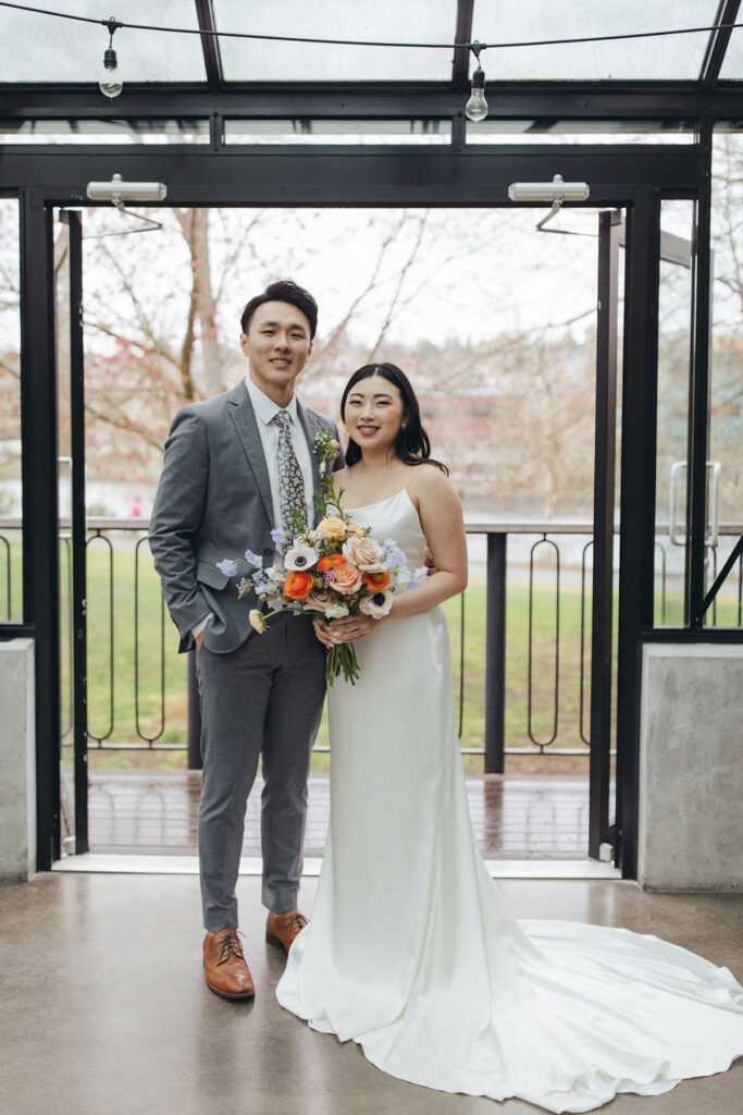 This spring-styled shoot in Seattle, Washington features delicate florals, colorful muted tones, and a charming venue!