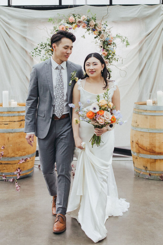 This spring-styled shoot in Seattle, Washington features delicate florals, colorful muted tones, and a charming venue!