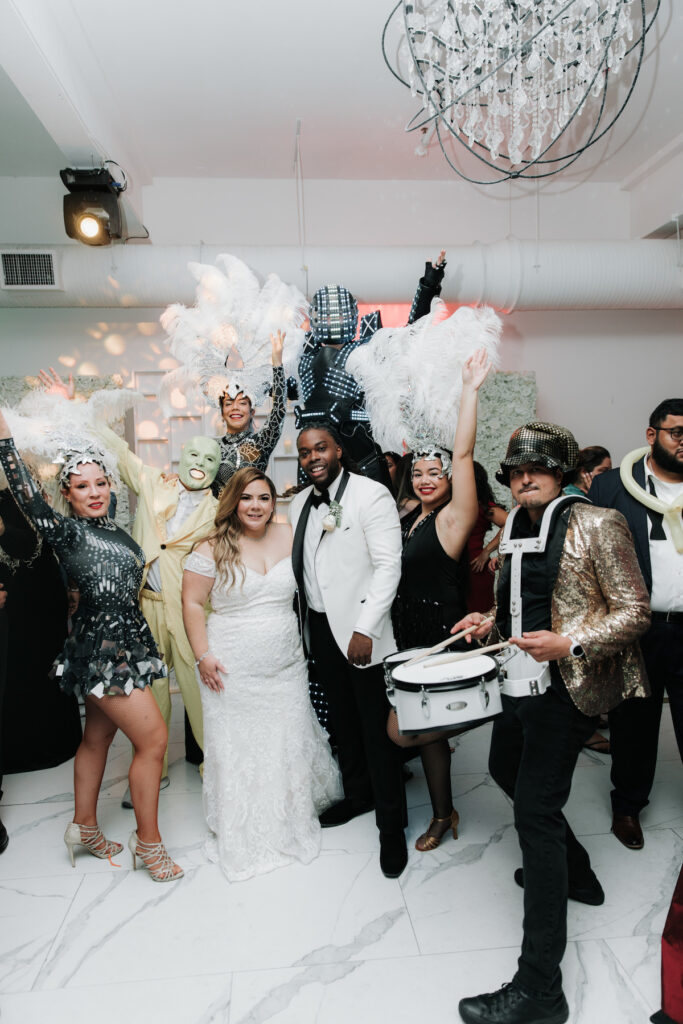 Alma & Khurram's wedding at La Maison in Belleville, NJ, was a celebration of Dominican and Jamaican culture with lux decor including a flower and candle wall, gorgeous centerpieces, and classy furniture with gold details.