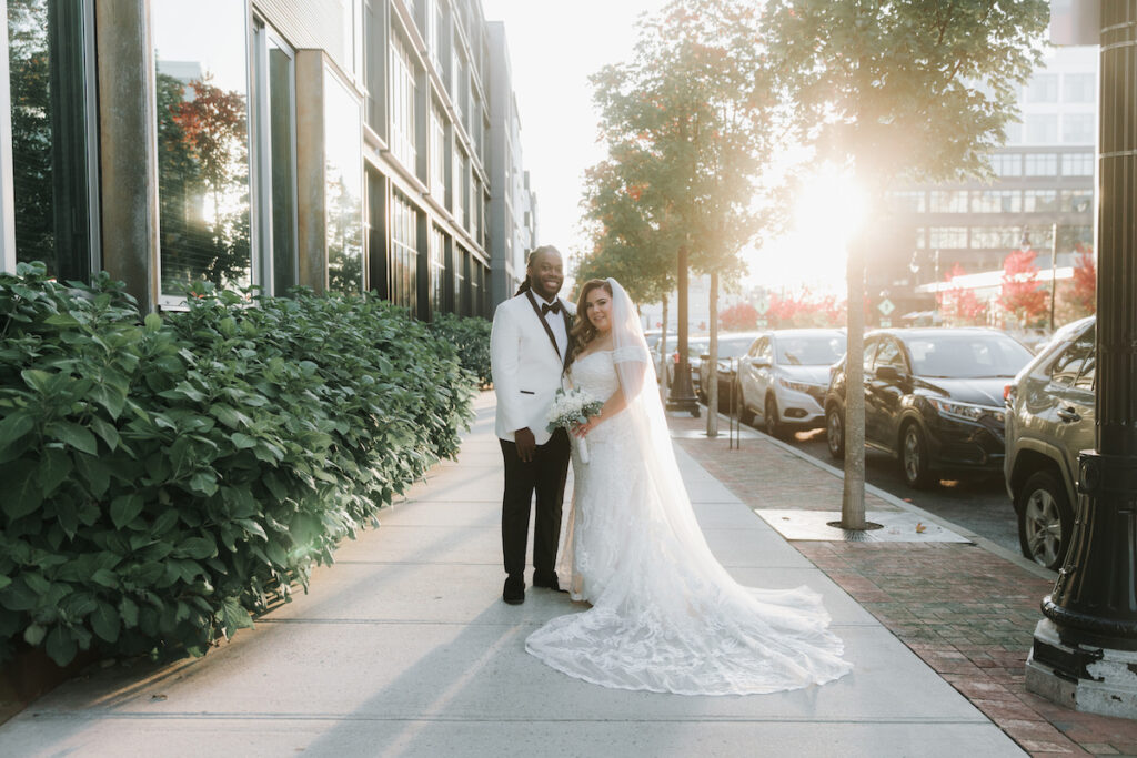 Alma & Khurram's wedding at La Maison in Belleville, NJ, was a celebration of Dominican and Jamaican culture with lux decor including a flower and candle wall, gorgeous centerpieces, and classy furniture with gold details.