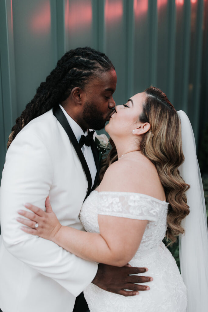 Alma & Khurram's wedding at La Maison in Belleville, NJ, was a celebration of Dominican and Jamaican culture with lux decor including a flower and candle wall, gorgeous centerpieces, and classy furniture with gold details.