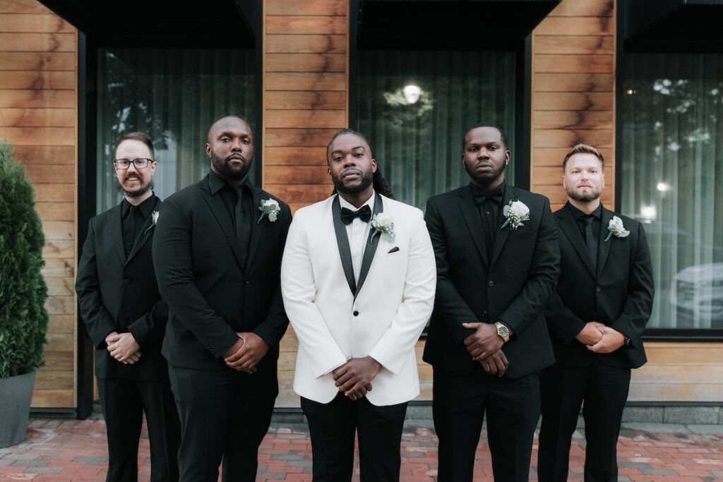 Alma & Khurram's wedding at La Maison in Belleville, NJ, was a celebration of Dominican and Jamaican culture with lux decor including a flower and candle wall, gorgeous centerpieces, and classy furniture with gold details.