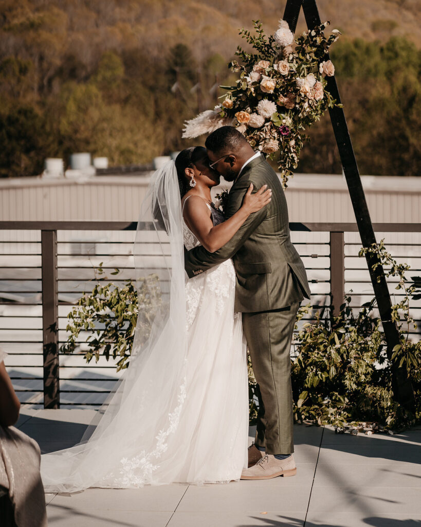 Tameka & Jeremy's Modern Boho Wedding at the Highland Brewing Co. in Asheville, NC features romantic muted earth tones and textured decor.