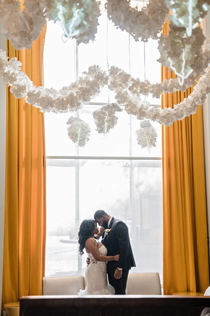 This moody art-infused styled shoot at the 21C Museum Hotel in Durham, NC, features elegant decor, contemporary art, & historic architecture.