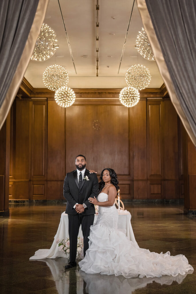 This moody art-infused styled shoot at the 21C Museum Hotel in Durham, NC, features elegant decor, contemporary art, & historic architecture.