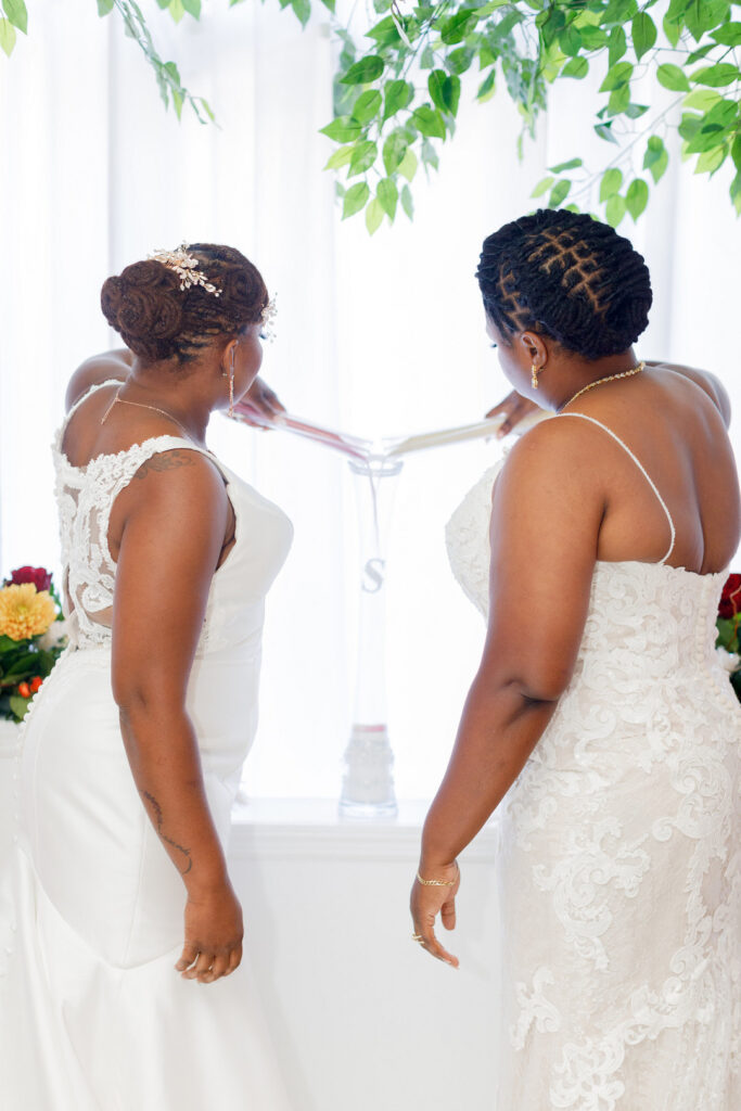 Couple celebrates their love in a colorful jewel-tone wedding at Your Signature Hall & Events in Charleston, South Carolina.