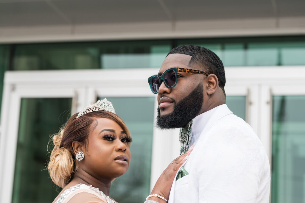 Dominique & Xavier Wiggins wed in a fabulous "A Night at the Oscars" themed wedding in downtown Memphis with black tie attire and gold decor.