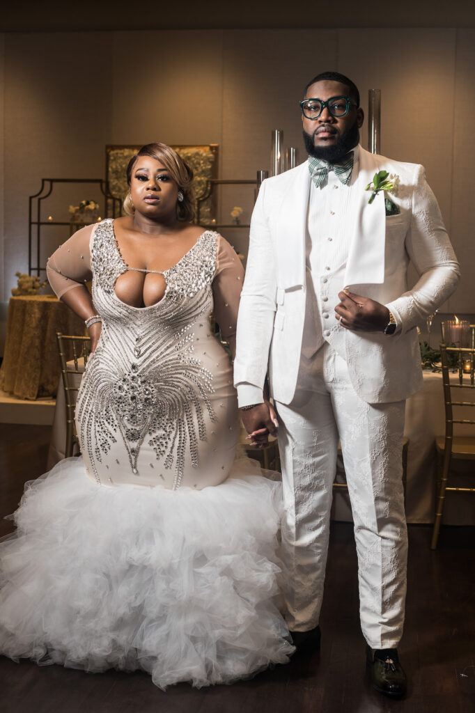 Dominique & Xavier Wiggins wed in a fabulous "A Night at the Oscars" themed wedding in downtown Memphis with black tie attire and gold decor.