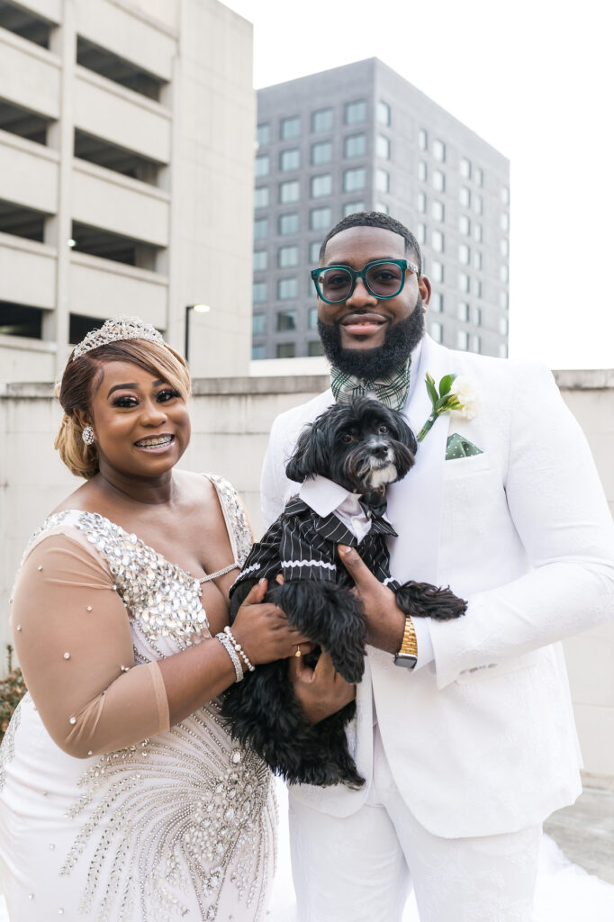 Dominique & Xavier Wiggins wed in a fabulous "A Night at the Oscars" themed wedding in downtown Memphis with black tie attire and gold decor.