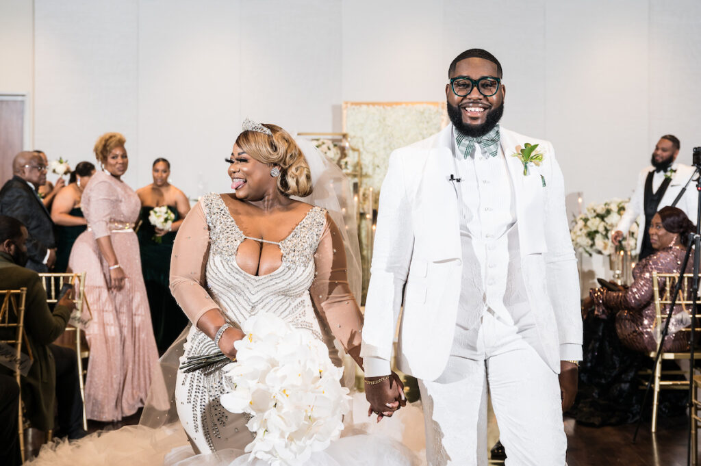 Dominique & Xavier Wiggins wed in a fabulous "A Night at the Oscars" themed wedding in downtown Memphis with black tie attire and gold decor.