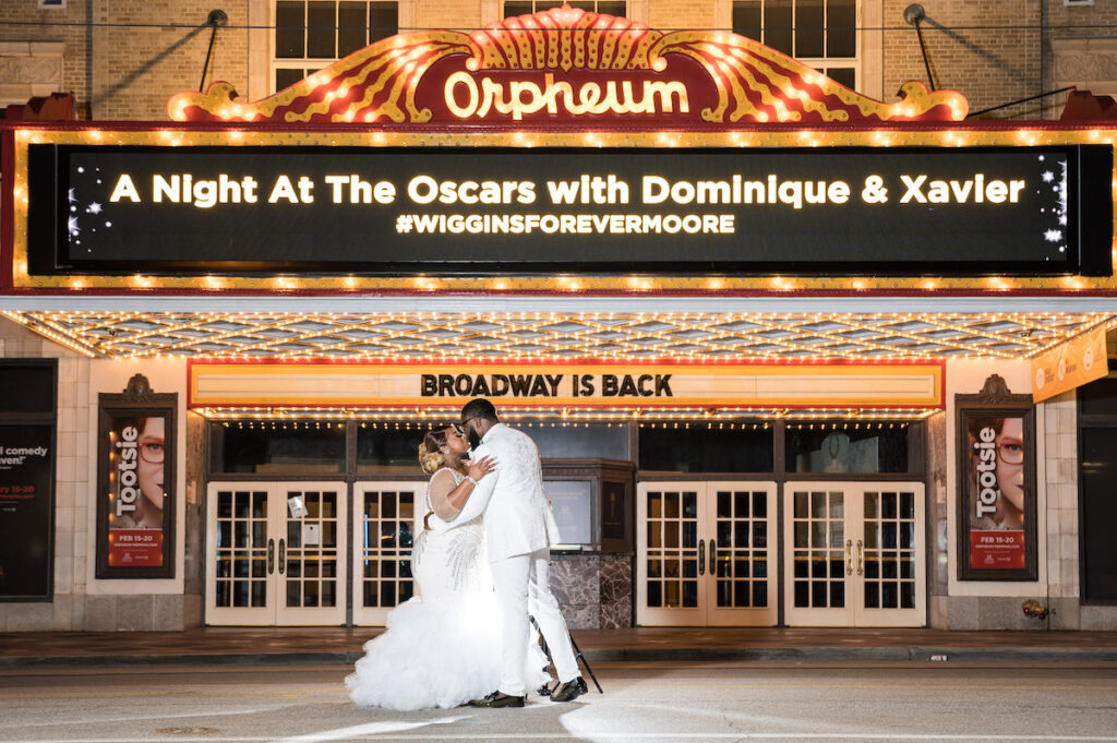 Dominique & Xavier Wiggins wed in a fabulous "A Night at the Oscars" themed wedding in downtown Memphis with black tie attire and gold decor.