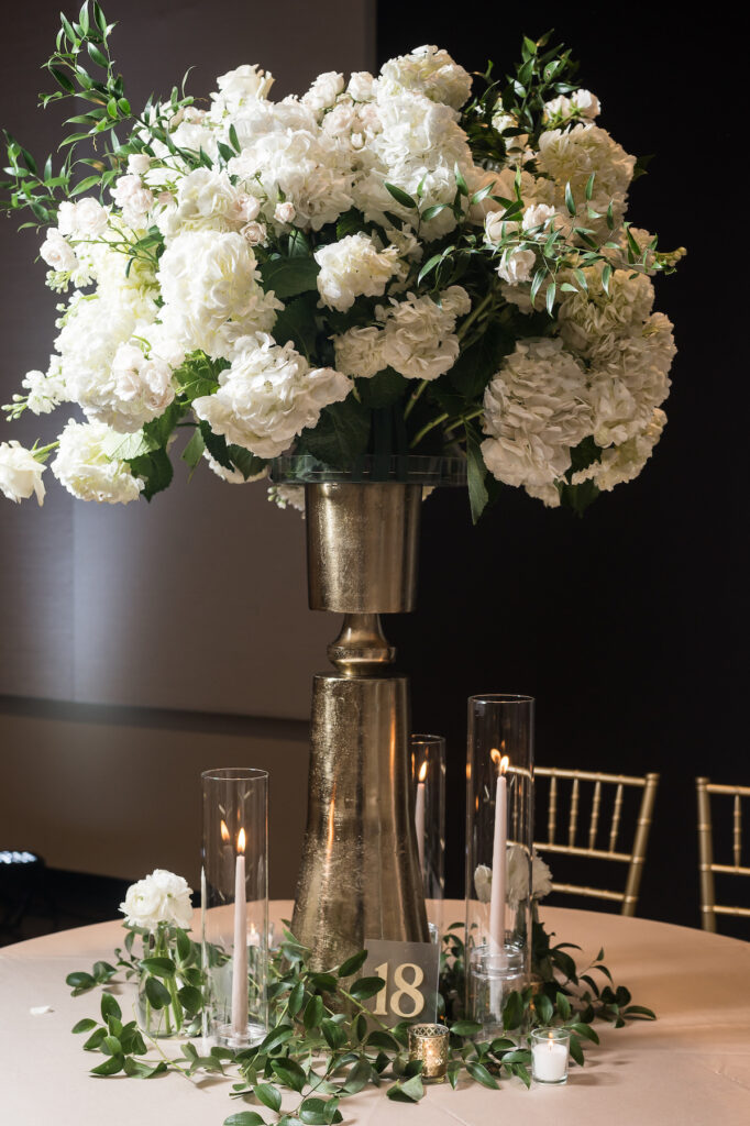 Dominique & Xavier Wiggins wed in a fabulous "A Night at the Oscars" themed wedding in downtown Memphis with black tie attire and gold decor.