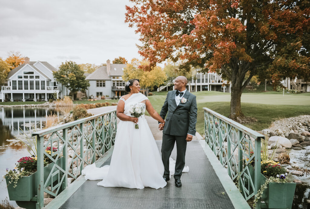 Mixing vintage and modern design, Christian and Leevy’s elegant autumn wedding features a cream and gold color palette and dramatic details.