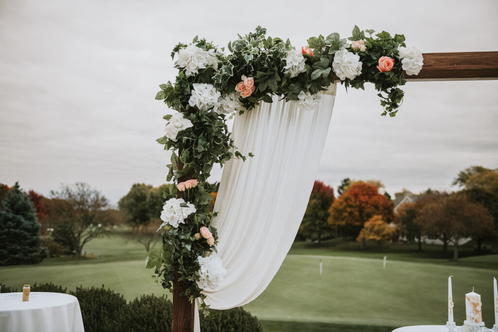 Mixing vintage and modern design, Christian and Leevy’s elegant autumn wedding features a cream and gold color palette and dramatic details.