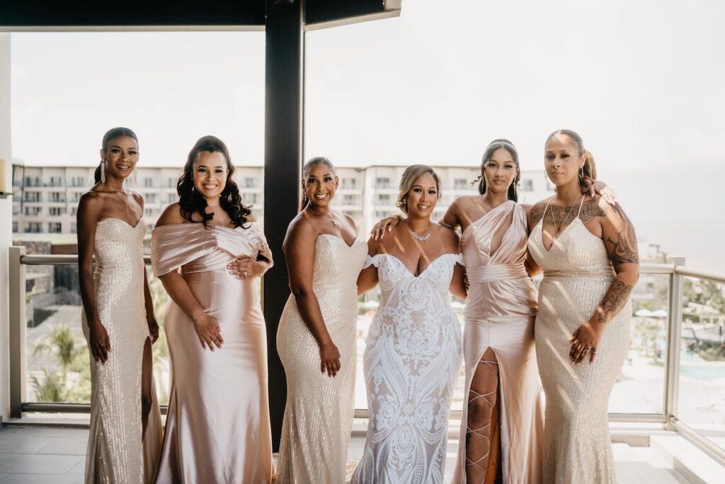 Beach waves and white sand welcomed guests to Alexis and Ronnie's summer outdoor destination wedding in Mexico.