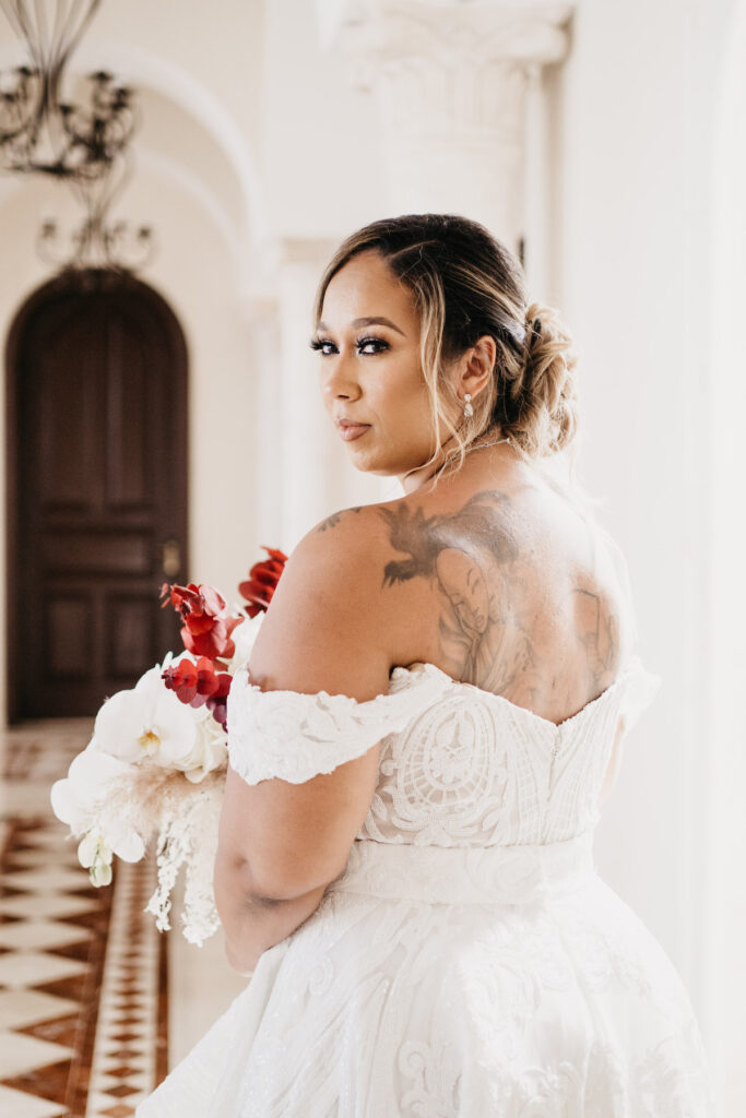 Beach waves and white sand welcomed guests to Alexis and Ronnie's summer outdoor destination wedding in Mexico.