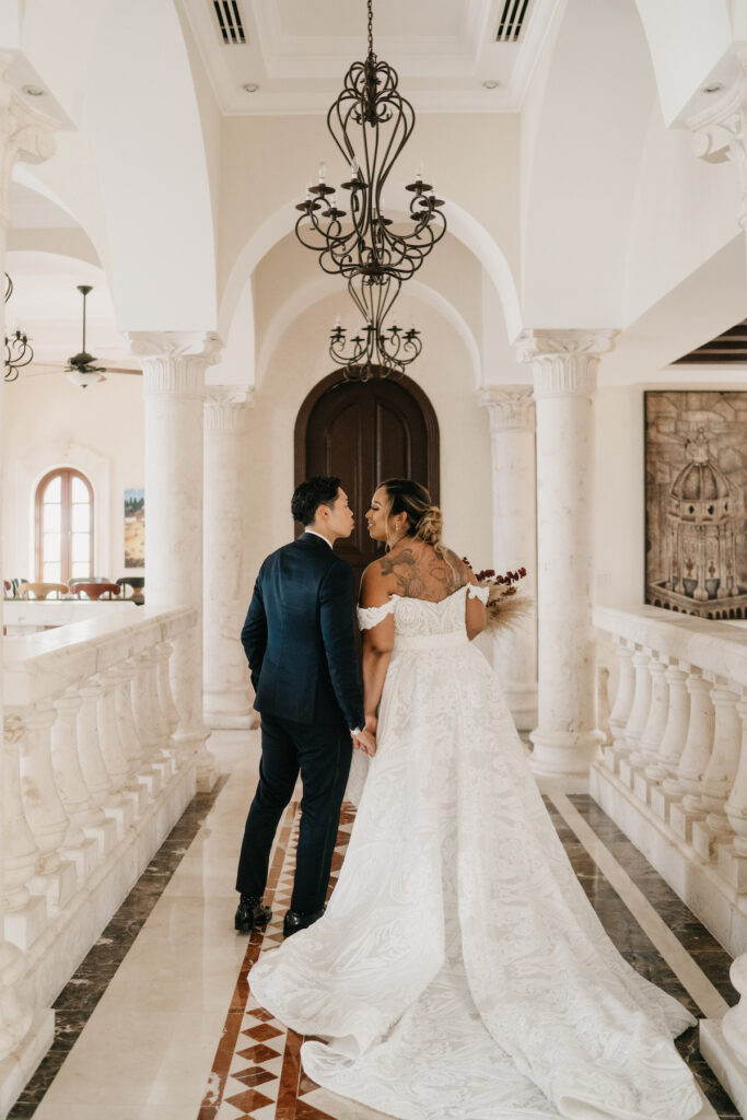 Beach waves and white sand welcomed guests to Alexis and Ronnie's summer outdoor destination wedding in Mexico.