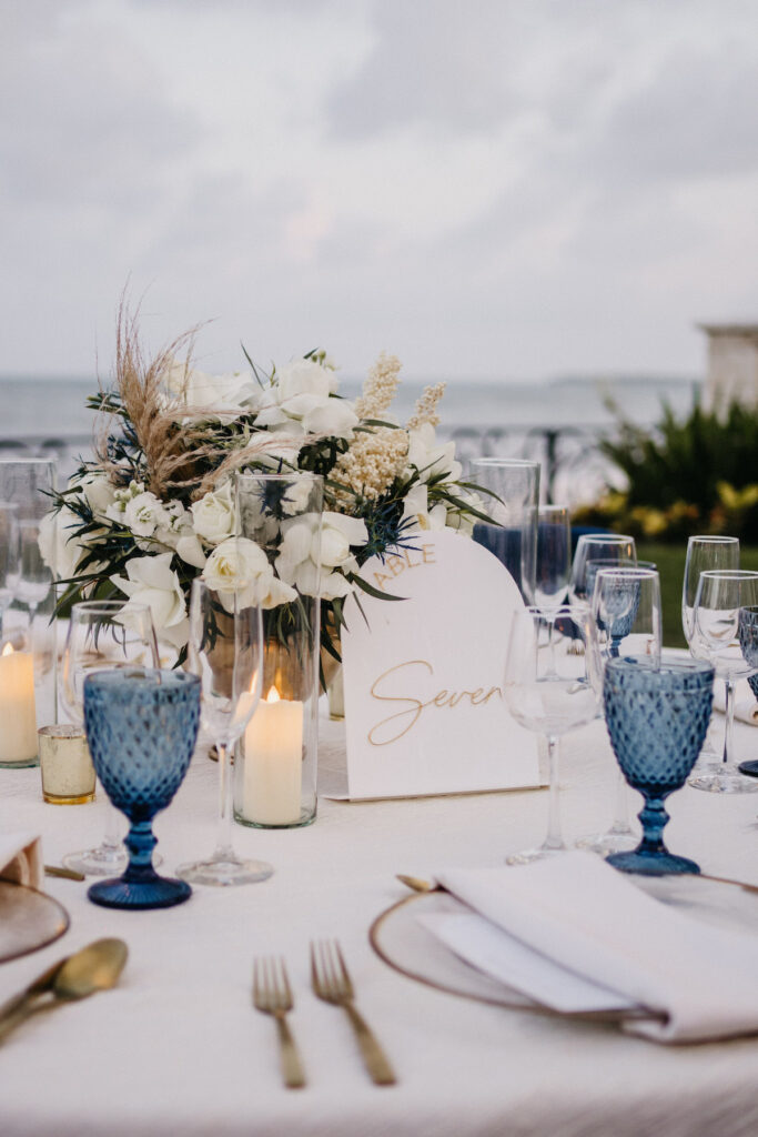 Beach waves and white sand welcomed guests to Alexis and Ronnie's summer outdoor destination wedding in Mexico.