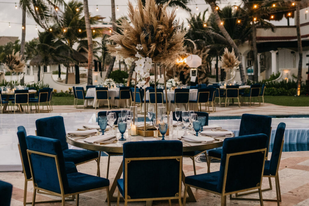 Beach waves and white sand welcomed guests to Alexis and Ronnie's summer outdoor destination wedding in Mexico.