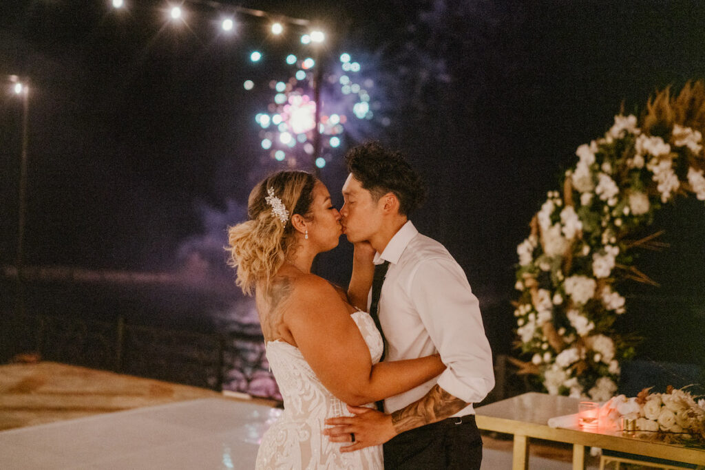 Beach waves and white sand welcomed guests to Alexis and Ronnie's summer outdoor destination wedding in Mexico.