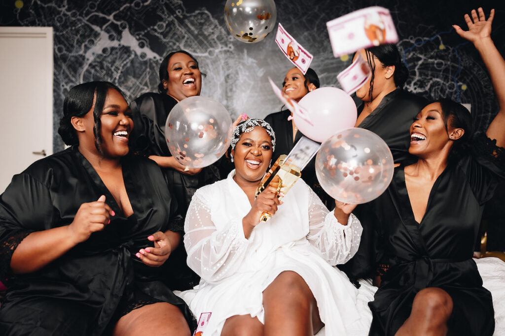 Brittany and LaQuan's dream wedding in Charlotte, NC, put a fun new spin on boho glam weddings with its super glam pink and black design.