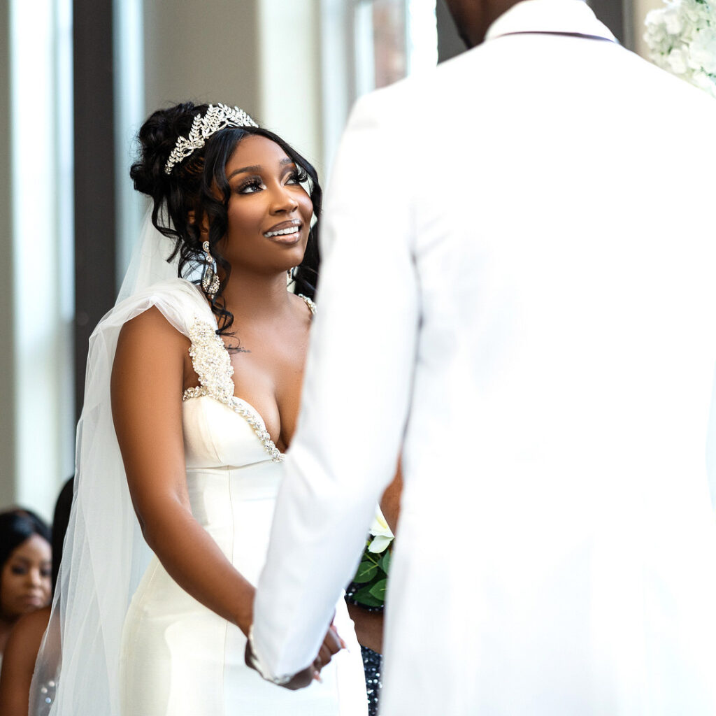 Amp & Asia's stunning black and white wedding at the 701 Whaley in Columbia, South Carolina, exudes classic elegance. 