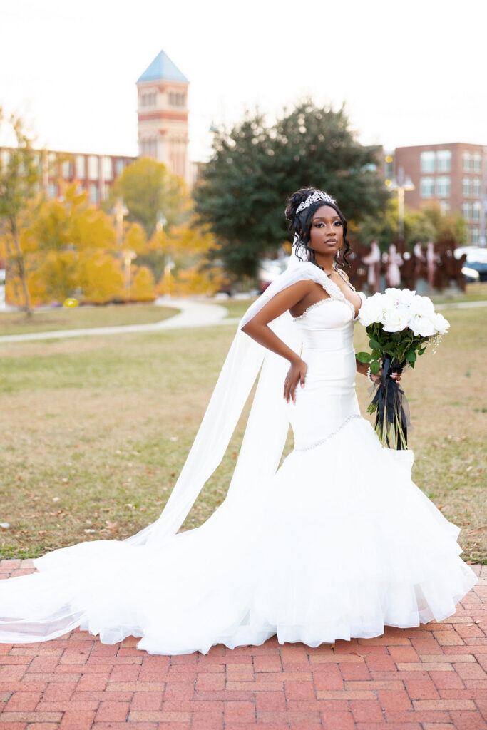 Amp & Asia's stunning black and white wedding at the 701 Whaley in Columbia, South Carolina, exudes classic elegance. 