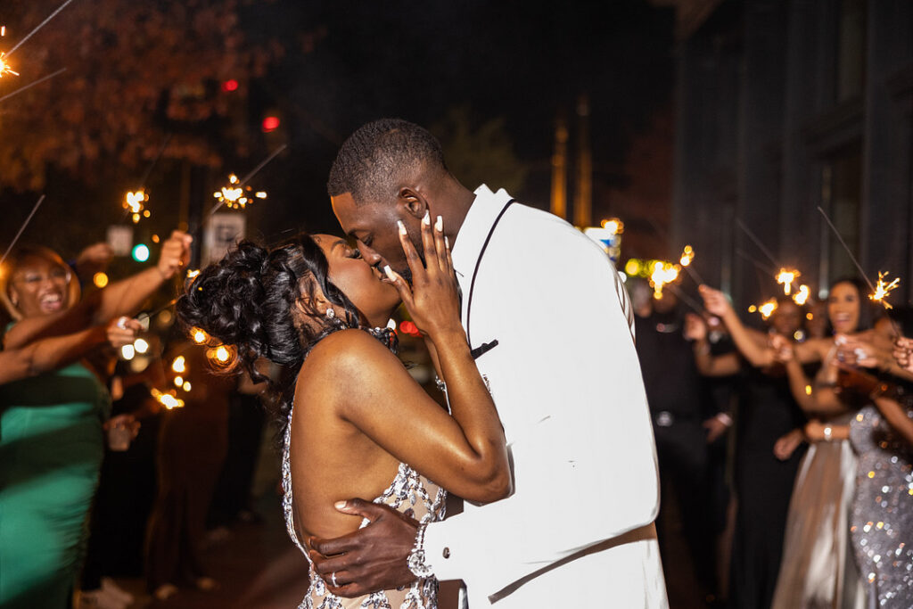 Amp & Asia's stunning black and white wedding at the 701 Whaley in Columbia, South Carolina, exudes classic elegance. 